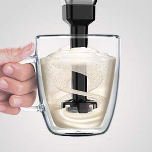    Illustration of the frother making foam in a cup of milk